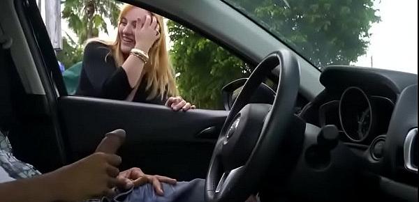  Cute blonde gives me nice handjob in public parking lot.MP4